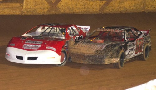 Chris Jones (17) and John Teasley (87) battle on the opening lap of the Modified Street feature during last Saturday's action at Hartwell Speedway in Hartwell, GA.  Racing action from the 3/8 mile track is highlighted on this week's Raceweek Illustrated Garage Talk program. Chris Jones would go on to score the win. Photo by Heather Rhoades