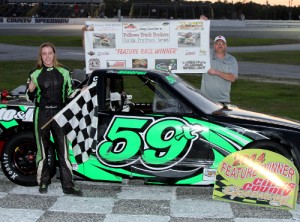Becca Monopoli celebrates in victory lane after scoring the win in the Joey Coulter Florida Pro-Trucks feature Saturday night at Citrus County Speedway.  Photo by Robert Crawford/Photos by Crawford