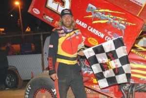 Lance Moss smiles in victory land after scoring his first USCS Sprint Car victory Saturday night at Carolina Speedway.  Photo by Frank Simek