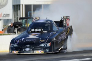 Alexis DeJoria does a burnout prior to a run during Friday's Funny Car qualifying action at the Atlanta Dragway.  Photo courtesy NHRA Media