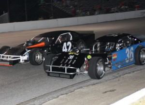 Lance Blacker (36) battles for position en route to scoring the Modified feature victory Saturday night at South Alabama Speedway.  Photo courtesy South Alabama Speedway Media