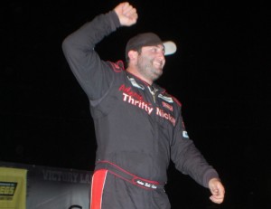 Bubba Pollard celebrates after climbing from his car after winning Friday night's Berlin 100 for the JEGS/CRA All-Stars Tour Friday night at Berlin Raceway.  Photo courtesy CRA Media