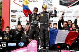 Gustavo Yacaman, Olivier Pla and their teammates celebrate in victory lane after scoring the win in Sunday's TUDOR Mobil 1 SportsCar Grand Prix.  Photo by Michael L. Levitt LAT Photo USA for IMSA