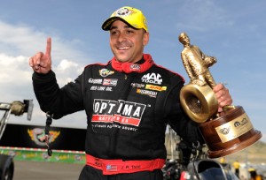 J.R. Todd is all smiles after winning in the Top Fuel finals at the Mopar Mile-High Nationals Sunday at Bandimere Speedway.  Photo courtesy NHRA Media