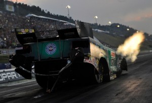 John Force powers off the line during Friday's Funny Car qualifying for the Mopar Mile-High Nationals at Bandimere Speedway.  Photo courtesy NHRA Media