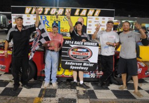 R.A. Brown and his team celebrate their third Late Model Stock feature win of the season Friday night at Anderson Motor Speedway.  Photo by Christy Kelley