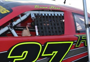 Brian Hoar gives the thumbs up from behind the wheel of his No. 37 Dodge Charger.  The Vermont driver turned in the fourth fastest lap in Friday's practice session.  Photo by Brandon Reed