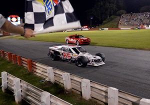 Danny Bohn crosses under the checkered flag to score the NASCAR Whelen Southern Modified Tour victory Saturday night at Bowman Gray Stadium.  Photo by Sarah Davis/NASCAR