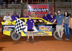 J.J. Garrett celebrates with his crew and family after scoring his fifth Stock Four Cylinder feature win of the season at Hartwell Speedway Saturday night.  Photo by Heather Rhoades
