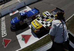 Ryan Blaney (29) nips German Quiroga (77) at the checkered flag for the win in Sunday's NASCAR Camping World Truck Series race in Bowmanville, Ontario, Canada.  Photo by Rainier Ehrhardt/NASCAR via Getty Images