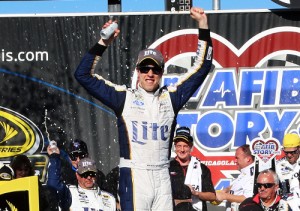 Brad Keselowski celebrates in victory lane after winning the first race in the Chase for the Sprint Cup Sunday at Chicagoland Speedway.  Photo by Jerry Markland/Getty Images for NASCAR