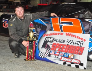 Bubba Winslow celebrates in victory lane after sweeping both Super Stock features at 5 Flags Speedway Friday night.  Photo by Fastrax Photos/Tom Wilsey/Loxley, AL