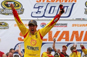 Joey Logano celebrates in victory lane after winning Sunday's NASCAR Sprint Cup Series race at New Hampshire Motor Speedway.  Photo by Jonathan Ferrey/NASCAR via Getty Images