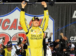 Kyle Busch celebrates after winning Saturday's NASCAR Camping World Truck Series race at Chicagoland Speedway.  Photo by Daniel Shirey/Getty Images