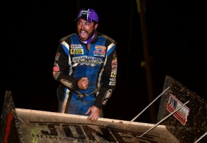 Michael Miller celebrates with a wing walk after winning in the USCS Sprint Car “Sunday of Speed” at Toccoa Speedway Sunday night.  Photo by Chris Seelman