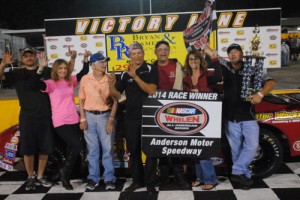 R.A. Brown celebrates with his team after sweeping Friday night's twin Late Model Stock features in Anderson Motor Speedway's season finale.  Photo by Christy Kelley