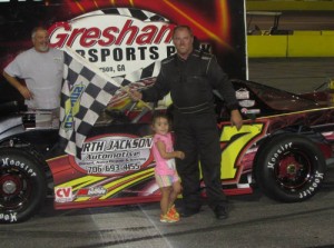 Russell Shore made his first trip of the year to Gresham Motorsports Park's victory lane in Saturday night's Outlaw Late Model finale.  Photo courtesy GMP Media