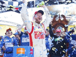 Dale Earnhardt, Jr. celebrates in Victory Lane after winning Sunday's NASCAR Sprint Cup Series race at Martinsville Speedway.  Photo by Robert Laberge/NASCAR via Getty Images