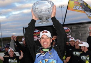 Doug Coby celebrates after scoring his second NASCAR Whelen Modified Tour championship Sunday afternoon at Thompson Speedway.  Photo by Darren McCollester/Getty Images for NASCAR
