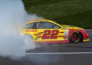 Joey Logano celebrates with a burnout after scoring the win last week's NASCAR Sprint Cup Series race at Kansas Speedway.  Photo by Robert Laberge/NASCAR via Getty Images