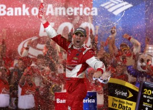 Kevin Harvick celebrates after winning Saturday night's NASCAR Sprint Cup Series race at Charlotte Motor Speedway.  Photo by Sarah Glenn/Getty Images