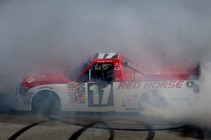 Timothy Peters celebrates with a burnout after winning Saturday's NASCAR Camping World Series race at Talladega Superspeedway.  Photo by Sean Gardner/NASCAR via Getty Images