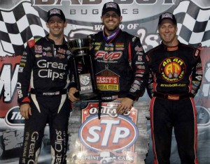 Winner Brian Brown (center) second place Stevie Smith (right) and third place Daryn Pittman (left) stand in victory lane after the World of Outlaws STP Sprint Car Series World Finals Saturday night at The Dirt Track at Charlotte.  Photo by CMS/HHP