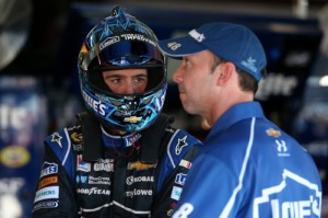 Chad Knaus (right), crew chief for NASCAR Sprint Cup driver Jimmie Johnson (left), was called to the NASCAR hauler after Sunday's race at Homestead-Miami Speedway for failing to obey a NASCAR directive in connection with a wheel spacer put on the No. 48 car.  Photo by Todd Warshaw/NASCAR via Getty Images