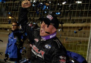 Darrell Lanigan celebrates after scoring Friday night's World of Outlaws Late Model Series victory at The Dirt Track at Charlotte.  Photo by HHP/Andrew Coppley