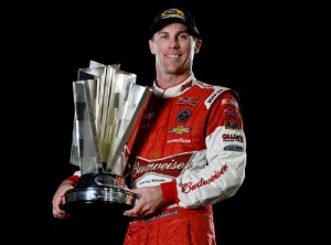 Kevin Harvick poses with the NASCAR Sprint Cup Series trophy after winning the series championship Sunday night at Homestead-Miami Speedway.  Photo by Jared C. Tilton/NASCAR via Getty Images