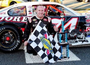 Ryan Moore scored the PASS South Super Late Model victory in a wild finish to Sunday's North-South Shootout at Caraway Speedway.  Photo by Laura / LWpictures.com