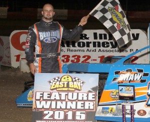 Kyle Bronson powered to the Open Wheel Modified victory Thursday night to open the 2015 Winternationals at East Bay Raceway Park.  Photo by Mike Horne