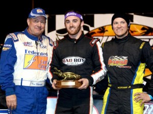 Austin Dillon (center) outran veteran racer Ken Schrader (left) and Billy Workman, Jr. (right) for the win in Sunday night's DIRTcar UMP Modified feature.  Photo courtesy DIRTcar Nationals Media