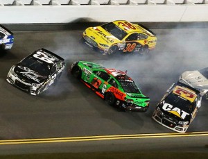 Danica Patrick (10) was involved in an on-track incident with Ryan Newman (31) and Brian Scott (62) during the second Budweiser Duel.  Photo by Brian Lawdermilk/NASCAR via Getty Images