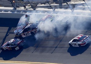 Reed Sorenson(44) and Clint Bowyer (15) set off this accident that gathered up Bobby Labonte (32) and J.J. Yeley (23) during Sunday's qualifying.  Austin Dillon (3) and David Ragan (34) managed to avoid the melee. Photo by Matt Sullivan/Getty Images