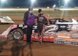 Matt Henderson talks to announcer Roby Helm in victory lane after scoring his first career NeSmith Chevrolet Dirt Late Model Series win Saturday night at Golden Isles Speedway.  Photo by Adam Stewart