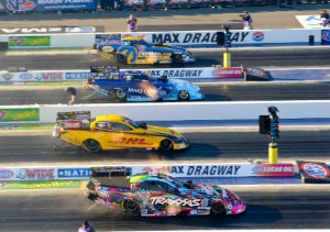 Courtney Force (bottom) was fastest in Funny Car qualifying on Saturday for the NHRA Four-Wide Nationals at zMax Dragway near Charlotte, NC.  Photo courtesy NHRA Media