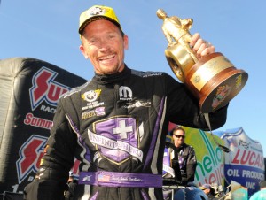Jack Beckman is all smiles after scoring the Funny Car victory at Sunday's NHRA Four-Wide Nationals at Charlotte.  Photo courtesy NHRA Media