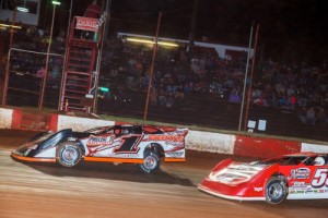 Jason Hiett (1) edges out Ray Cook (53) at the checkered flag to score the win in Saturday night's Southeasten Classic Super Late Model feature at Dixie Speedway.  Photo by Kevin Prater/praterphoto.com