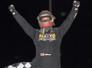 Robert Ballou celebrates in victory lane after winning Friday night's USAC AMSOIL National Sprint Car Series feature at East Bay Raceway Park.  Photo courtesy EBRP Media