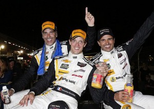 Joao Barbosa, Sebastien Bourdais and Christian Fittipaldi celebrate after winning Saturday's 12 Hours of Sebring.  Photo by Michael L. Levitt LAT Photo USA