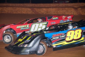 Grant Jordan (05) battles with Russell Fleeman (98) for the lead in the SECA Late Model feature at Hartwell Speedway.  Jordan would go on to score the victory.  Photo by Heather Rhoades