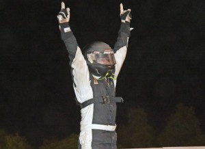 Joseph Joiner  performs the roof dance on top of his car on Saturday night at Southern Raceway in Milton, FL after winning the 2015 season opener for the NeSmith Panhandle Challenge Series as part of the NeSmith Chevy Weekly Racing Series.  Photo by Brian McLeod