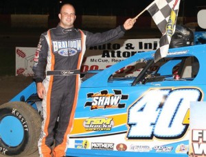Kyle Bronson celebrates in East Bay Raceway Park's victory lane after winning the Open Wheel Modified feature Saturday night.  Photo courtesy EBRP Media