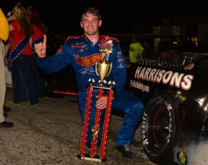 Kyle Grissom celebrates in victory lane after scoring the Southern Super Series victory Friday night at 5 Flags Speedway. Photo by Fastrax Photos/Tom Wilsey/Loxley, AL