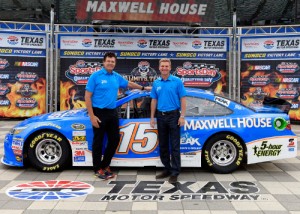 Clint Bowyer (right) and team owner Michael Waltip pose with the #15 Maxwell House Toyota in victory lane at Texas Motor Speedway.  Photo by Robert Laberge/Getty Images for Texas Motor Speedway