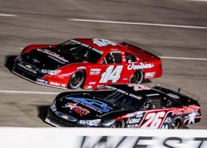 Willie Allen (26) works his way around Sterling Marlin (114) en route to the Pro Late Model victory Saturday night at Fairgrounds Speedway Nashville.  Photo by Barry Cantrell / Short Track Spotlight.com