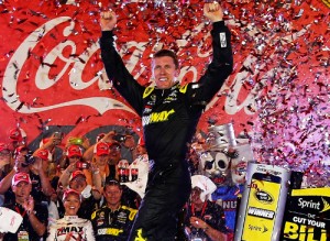 Carl Edwards celebrates in victory lane after winning Sunday's NASCAR Sprint Cup Series race at Charlotte Motor Speedway.  Photo by Jerry Markland/Getty Images