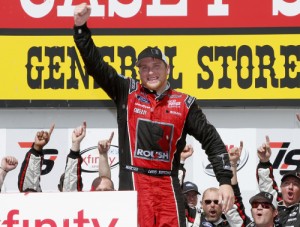 Chris Buescher celebrates in victory lane after winning Sunday's NASCAR Xfinity Series race at Iowa Speedway.  Photo by Todd Warshaw/NASCAR via Getty Images