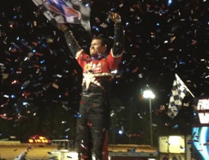 Chris Ferguson celebrates in victory lane after scoring his first career World of Outlaws Late Model Series victory Friday night at Friendship Motor Speedway.  Photo courtesy WoO Media